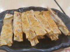 黑胡椒牛肉锅贴-四海游龙(大华店)