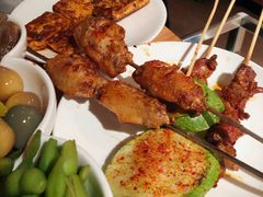 烤鸡翅中-阿里家·新疆烤肉酒場 by MIG