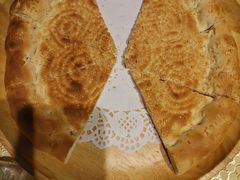 馕坑芝麻馕-巴扎美食·新疆菜·西域歌舞表演餐厅(新疆大厦店)
