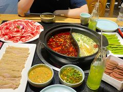 -明何记涮牛肚(品牌首店隋唐植物园南门古城路店)