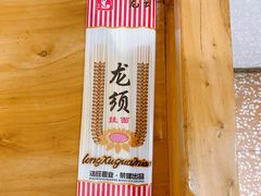 -明何记涮牛肚(品牌首店隋唐植物园南门古城路店)