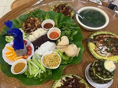 -沐毫傣泐云南菜孔雀宴•手抓饭傣味烧烤(曼听公园店)