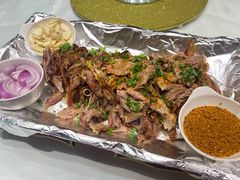 特色烤羊腿-歆和农庄·烤全羊