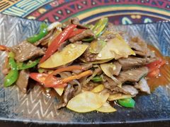 酸木瓜炒牛肉-紫滇源云南生态菜(丹凤街店)