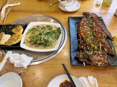 -明何记涮牛肚(品牌首店隋唐植物园南门古城路店)