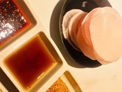 腌萝卜片-猪啊牛呀羊啊铜盘烤肉(正大广场店)