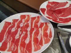 -明何记涮牛肚(品牌首店隋唐植物园南门古城路店)