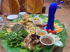 -沐毫傣泐云南菜孔雀宴•手抓饭傣味烧烤(曼听公园店)