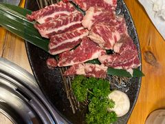 极品浇汁肥牛肋条-草家酱蟹炭火烤肉店(珲春南路一店)