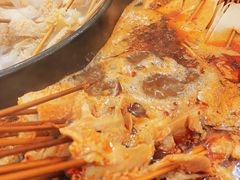 -明何记涮牛肚(品牌首店隋唐植物园南门古城路店)
