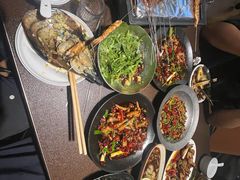 -曼听小寨海鲜烧烤·大连辣炒大王(盖州街店)
