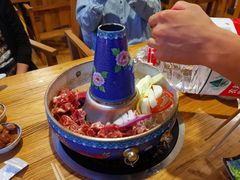 -毛辣果·贵州红酸汤牛肉火锅(西单店)