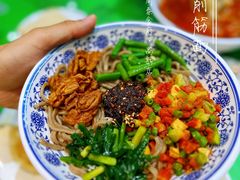 荞面削筋-令氏家外家周秦食府(高新店)