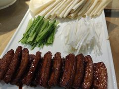 手抓滋油肉-江南驿·二十余年创意杭帮味(良渚玉鸟集店)