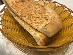 烤白馕-巴依老爷新疆美食(清华东门店)