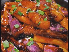 茄子烧年糕-恭喜上堓砂锅焗·海鲜大排档(闵行龙湖店)
