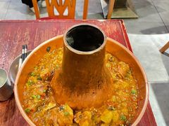 土司铜锅油焖鸡-浩海火烧云傣家菜(京广店)