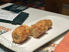 烤玉米-云海肴·汽锅鸡·云南代表菜(天山百盛优客店)