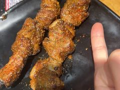 -明何记涮牛肚(品牌首店隋唐植物园南门古城路店)