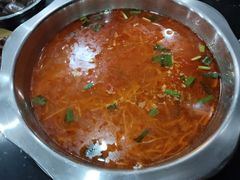 -黄利砖万峰林布依特色酸笋牛肉馆