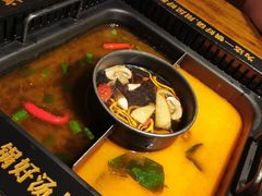 -老牌坊云南鱼豆花火锅(哈西万达店)