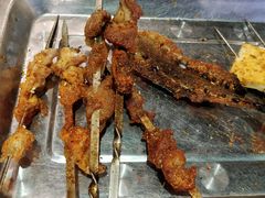 沾满辣椒的微辣串-群姐面馆·海鲜烧烤(同安路二店)