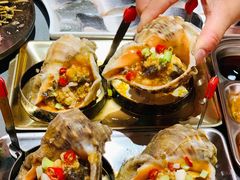 招牌大海螺-围炉肉舍•炭烤活鳗•丹东海鲜烤肉(步行街店)