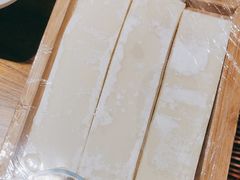 -老牌坊云南鱼豆花火锅(哈西万达店)