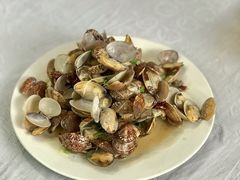 辣炒蛤蜊-1910老鲁味海鲜·戳子肉·青岛菜(金沙滩店)