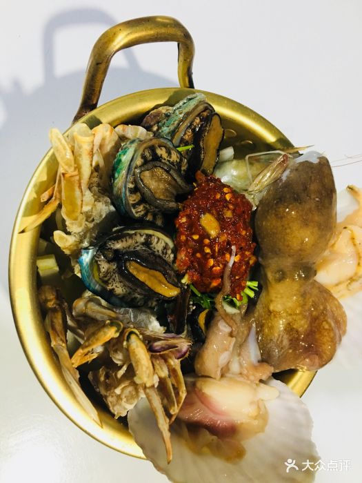 东海海鲜烧烤(发展店)生吃八爪鱼图片