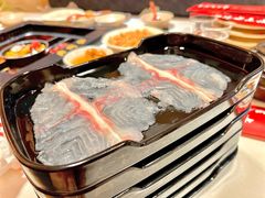 -老牌坊云南鱼豆花火锅(哈西万达店)
