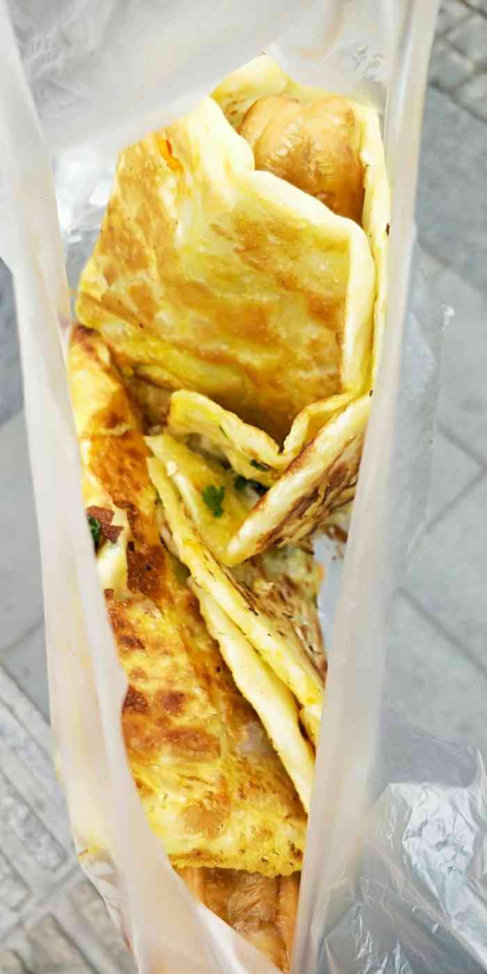 打分   /人 街边早餐店,生意很好,份量很足够,点