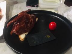 爆汁花椒脆皮乳鸽-柴门头啖汤·经典川菜·慢火汤品(锦城万达店)
