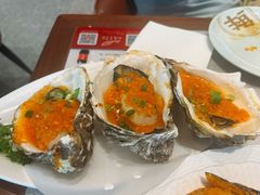 蒜蓉烤生蚝-船歌·鱼水饺青岛菜(太阳宫凯德MALL店)