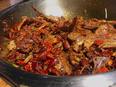 爆辣干锅鸭头-安诚居干锅鸭头(八角店)
