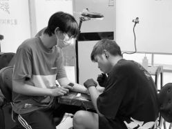 -龙之吻专业刺青·手工耳洞·纹身去色