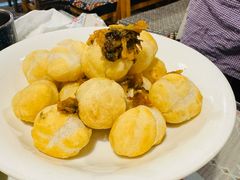 酸菜炒汤团-蜗牛小馆醉乡民谣云南菜(惠新西里店)