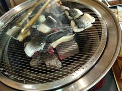 招牌活烤鳗鱼-围炉肉舍•炭烤活鳗•丹东海鲜烤肉(步行街店)