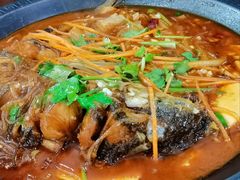 得莫利炖鲤鱼-九妹农家大铁锅东北菜(江湾店)