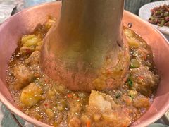 铜锅鸡肉-浩海火烧云傣家菜(京广店)