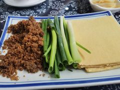 勾魂小媳妇-八两八金·莱芜特色炒鸡(市南漳浦路店)