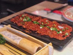 秘制麻辣鲜牛肉-尚尚仙·酸汤猪手·猪肚鸡火锅(华联万柳购物中心店)