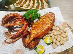 铁板香辣鱿鱼-草家酱蟹炭火烤肉店(珲春南路一店)