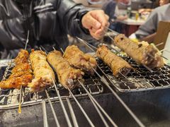 -喜悦小串丹东小黄牛海鲜烧烤大排档(民主广场店)