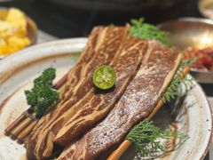 秘制LA牛排-草家酱蟹炭火烤肉店(珲春南路一店)