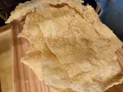 炸腐竹-烹然四季椰子鸡火锅(团结湖总店)