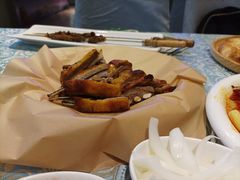 馕坑果木烤羊排-巴扎美食·新疆菜·西域歌舞表演餐厅(新疆大厦店)