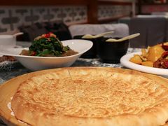 馕坑芝麻馕-巴扎美食·新疆菜·西域歌舞表演餐厅(新疆大厦店)