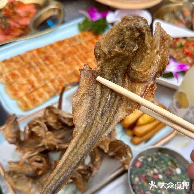 来星海就办了一件事，吃生腌…