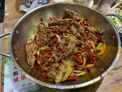 爆辣干锅鸭头-安诚居干锅鸭头(八角店)